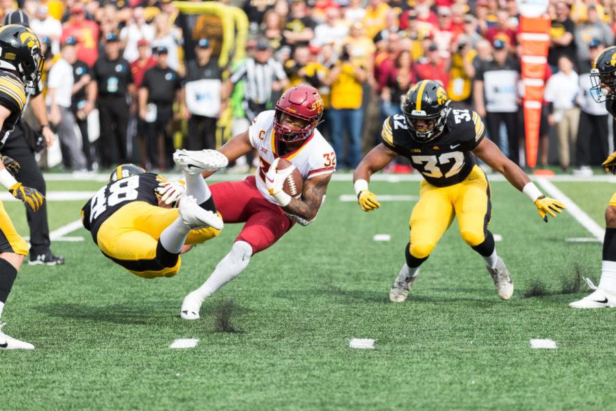Junior David Montgomery runs with the ball during the Iowa Corn Cy-Hawk Series game Sept. 8, 2018. The Hawkeyes defeated the Cyclones 13-3.