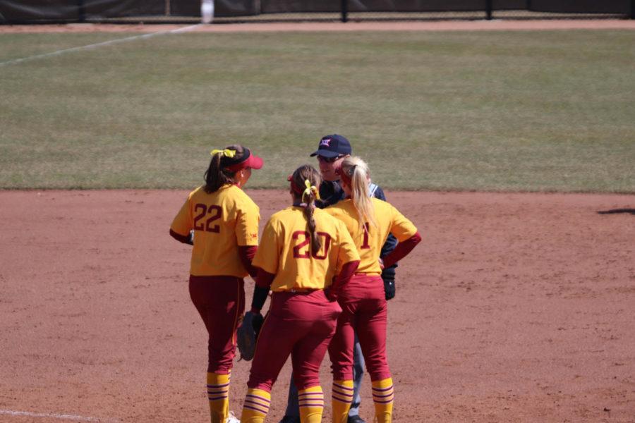 Pitcher Savannah Sanders, #22, first baseman Sally Woolpert, #20, and second baseman Kasey Simpson, #1, talk to one of the umpires about a call during Iowa States loss to Texas Tech. Iowa State lost to Texas Tech 8-4 on March 31, dropping their record to 18-15 overall and 1-5 in Big 12 play.  