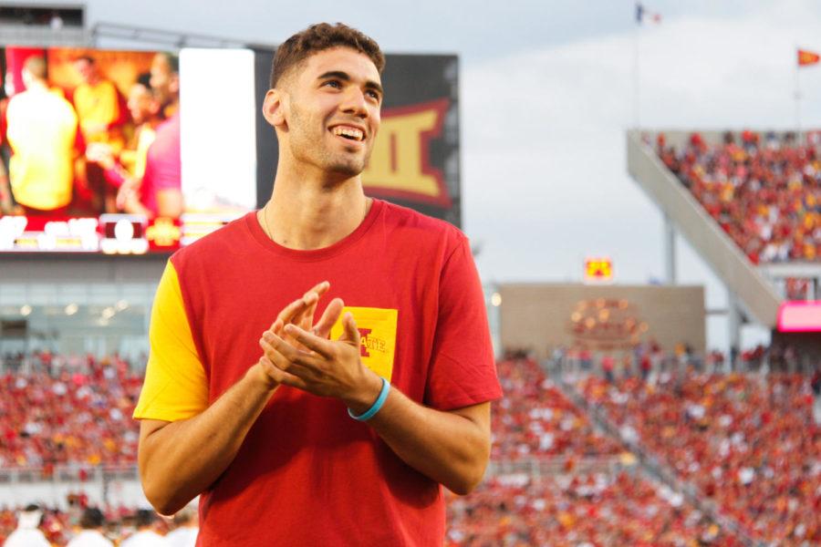 Former Cyclone basketball player Georges Niang laughs while watching a highlight reel, before being named the Male Athlete of the Year on Sept 3, 2016.
