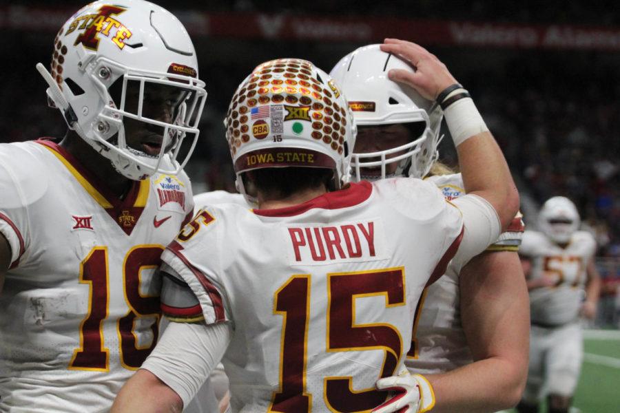 Teammates celebrate a touchdown made by Brock Purdy at the Alamo Bowl on Dec. 28, 2018. The Cyclones fell to the Cougars 28-26.