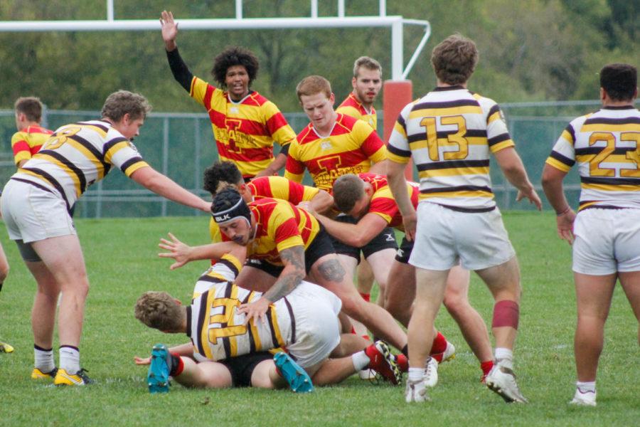 ISU mens rugby players tackle players form Mizzous rugby team during their game on Sept. 29 at ISUs southwest athletic complex. Iowa State won 24-0 against the tigers.