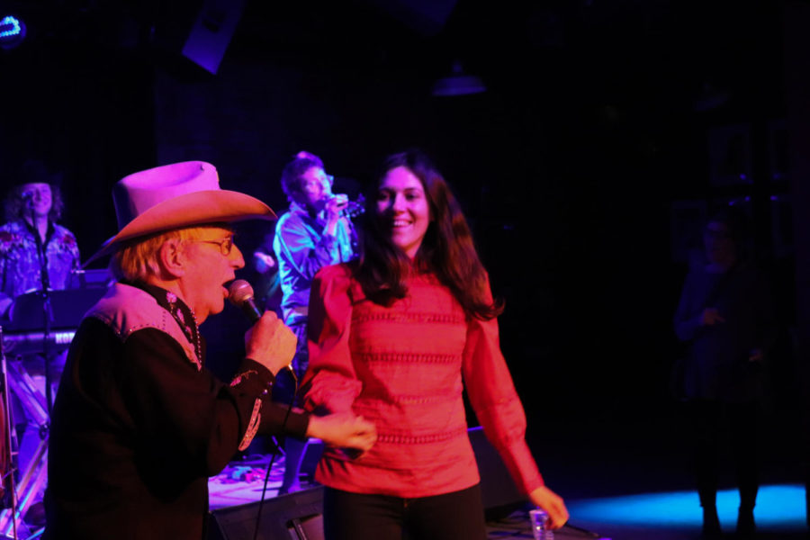 Patrick Haggerty of Lavender Country dances with an audience member at the Maintenance Shop on April 18. Lavender Country and Paisley Fields have been touring together since March 13. 