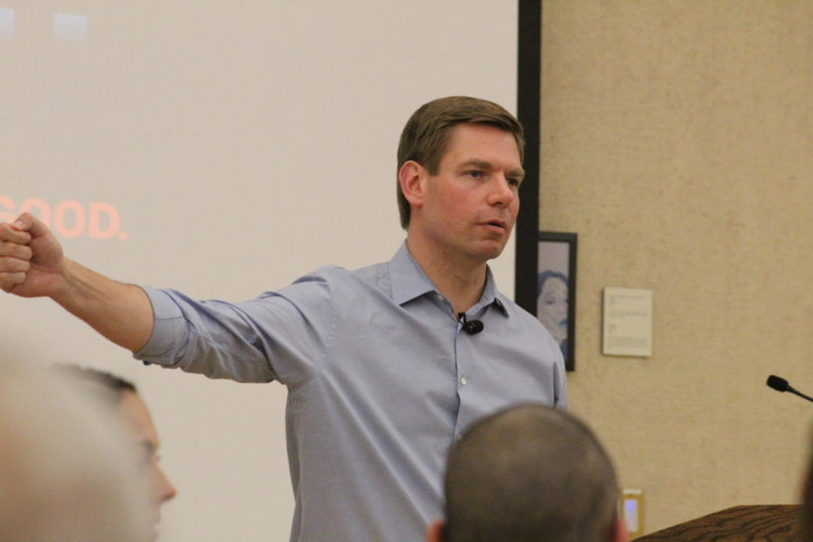 Eric Swalwell talks about healthcare in America being less like healthcare and more like sick care during his presentation in the Gallery Room of the Memorial Union on Thursday. 