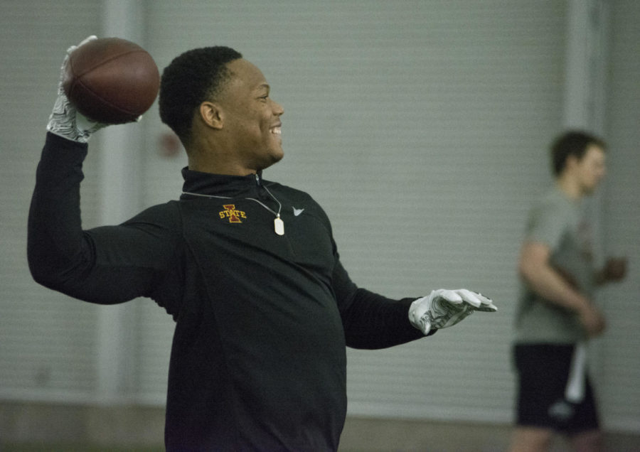 Former running back David Montgomery practices throwing during Pro Day at Bergstrom Football Complex on March 26, 2019.