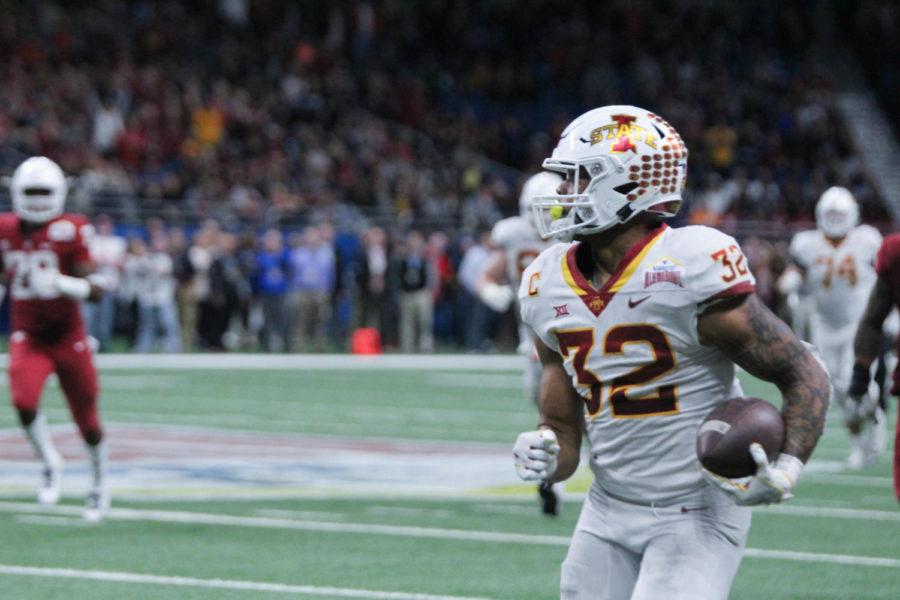 Then-junior running back David Montgomery runs a pass at the Alamo Bowl game on Dec. 28. The Cyclones fell to the Cougars 28-26.