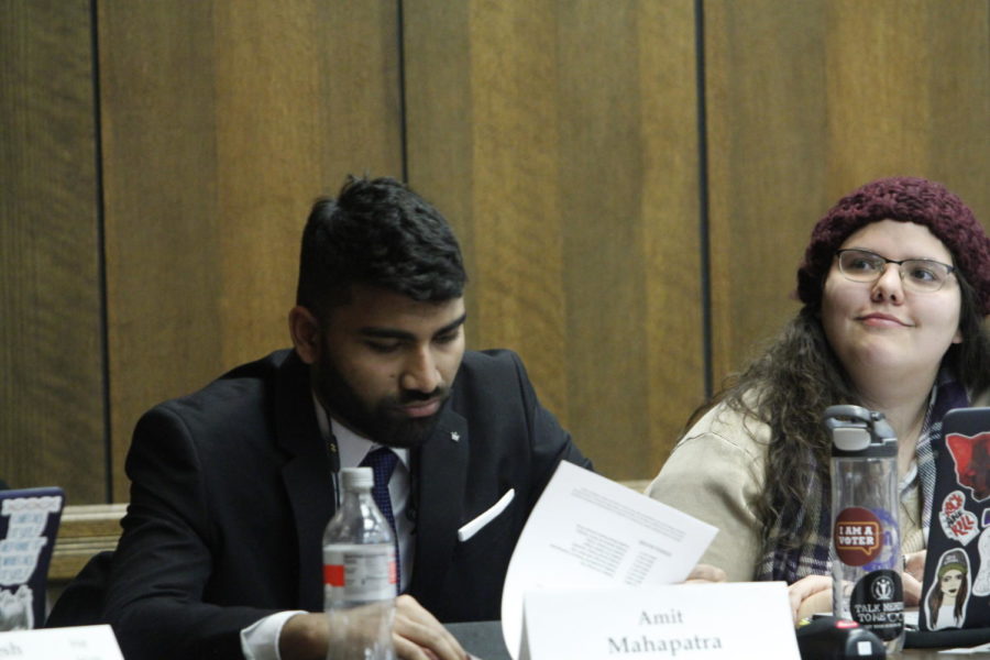 Graduate student in supply chain and information systems Amit Mahapatra and College of Design Senator Kaitlyn Sanchez listen to funding requests. Student Government held a meeting on Feb. 13 in the Campanile Room in the Memorial Union.