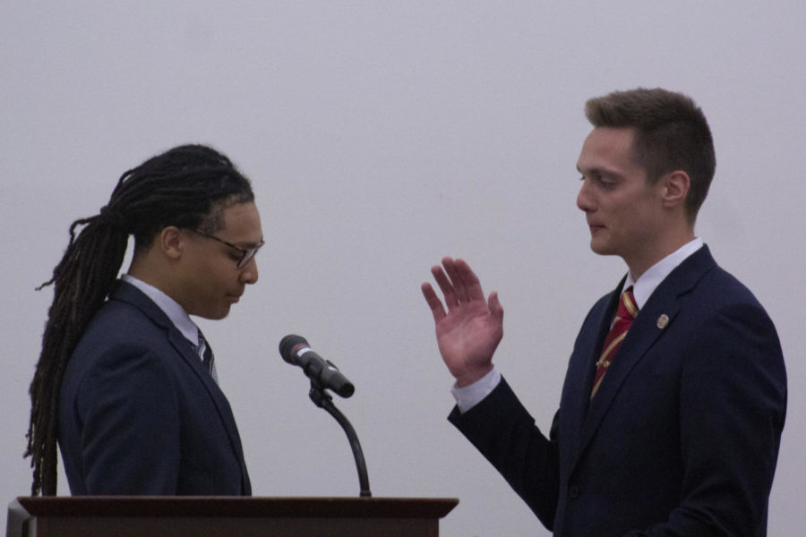 Previous Student Government president, Julian Neely, swears in newly elected president, Austin Graber. Graber and Vishesh Bhatia were inaugurated at the ISU Alumni Center on April 11. Graber and Bhatia won the race for Student Government president and vice president with their campaign “Elevate. Educate. Connect.” 