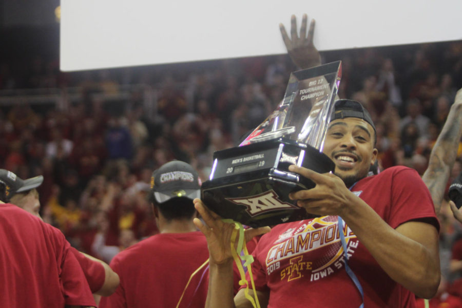 Freshman guard Talen Horton-Tucker holds up the Big 12 Championship trophy. Iowa State won the Big 12 Championship 78-66 against the University of Kansas on March 16, 2019, at the Sprint Center in Kansas City, Missouri.