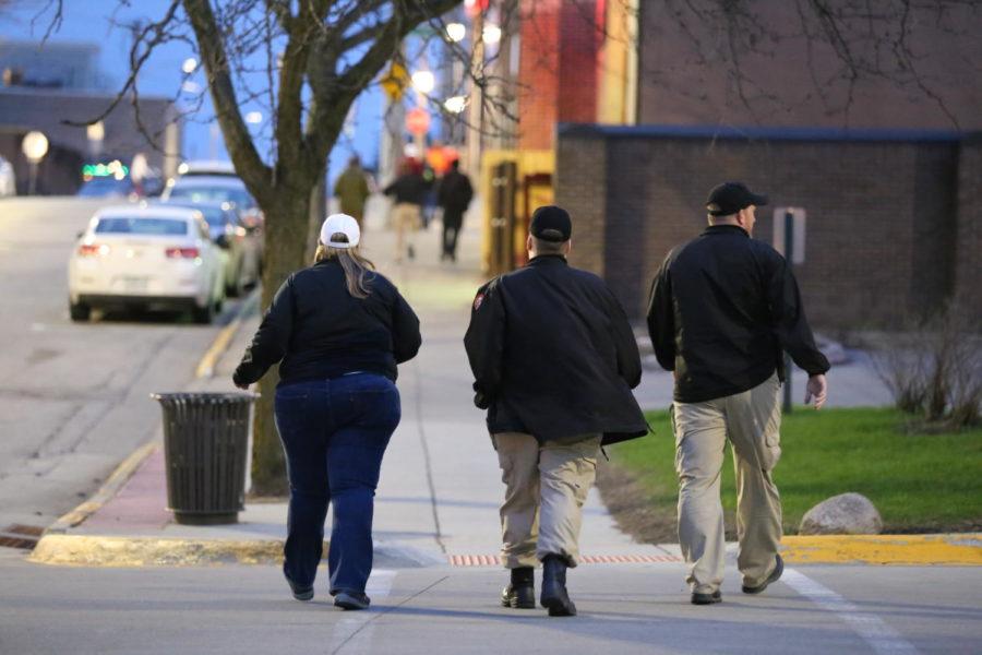 A group takes off down Chamberlin street to identify issues that could be a potential hazards to pedestrians. This is an annual walk to keep the Campustown safe as its a heavy traffic area of Ames. The walk was hosted by the city of Ames and Ames Police department Wednesday, Apr. 17.