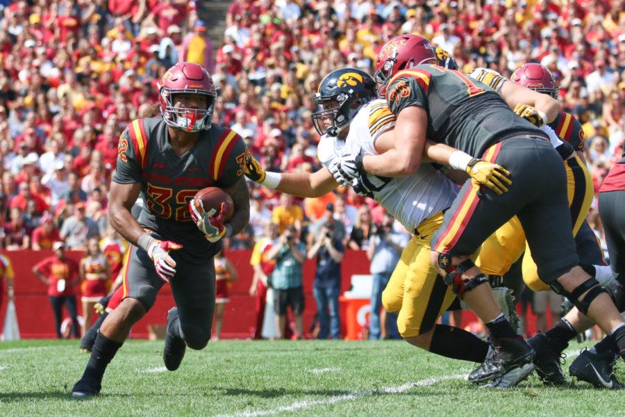 Iowa States David Montgomery breaks from the pack during the annual CyHawk football game Sept. 9, 2017. The Cyclones fell to the Hawkeyes 44-41 in one overtime.