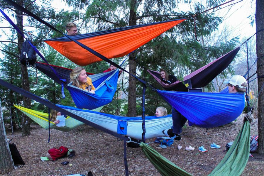 Some ISU students enjoy the long-awaited spring weather in their hammocks April 11, 2018, on Central Campus. 
