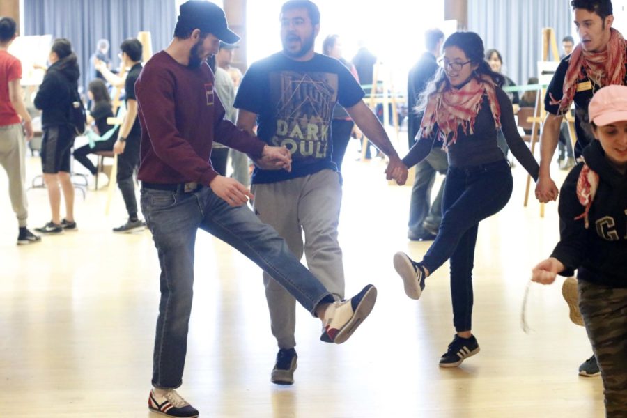 Iowa State students perform the dance, Dabke at the 2019 International Food Festival. The International Student Council held their event in the South Ballroom of the Memorial Union on April 14.