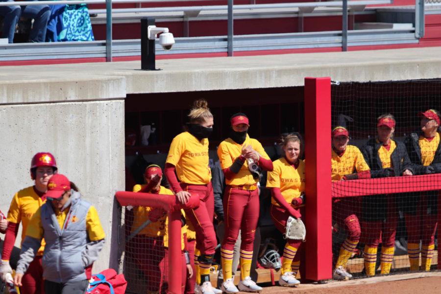 Redshirt sophomore Talyn Lewis (left) and sophomore Skyler Ramos (right) talk and stay warm during Iowa States at bat in the third inning of Iowa States loss to Texas Tech. Iowa State lost to Texas Tech 8-4 on March 31, dropping their record to 18-15 overall and 1-5 in Big 12 play. 