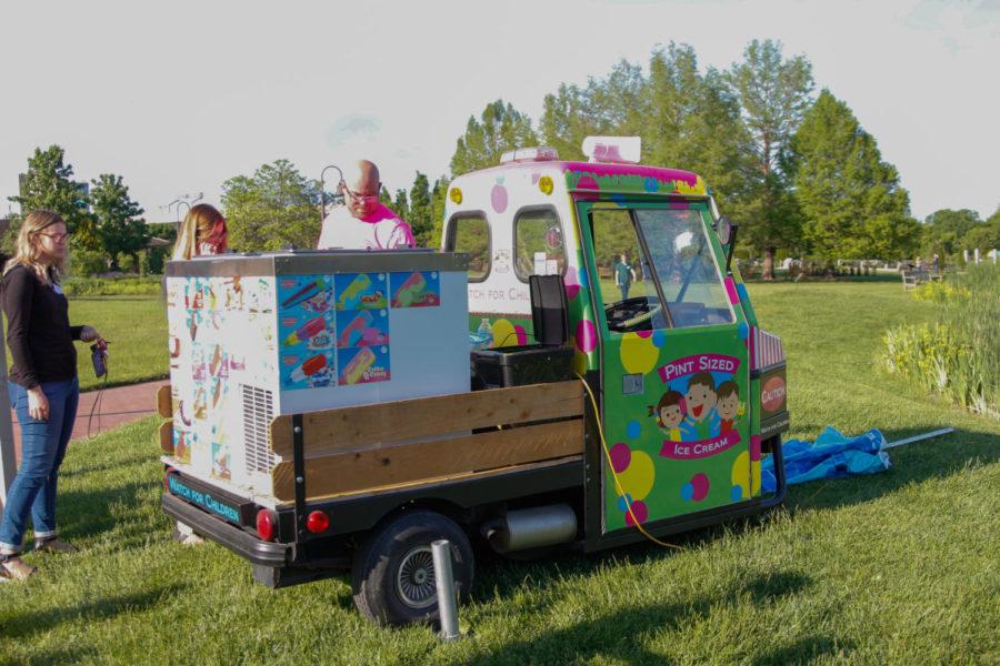 Pint Sized Ice Cream works as one of the vendors for the Young Professionals of Ames Fuel Fest at Reiman Gardens on May 30. The event included food, alcohol and a live music act.