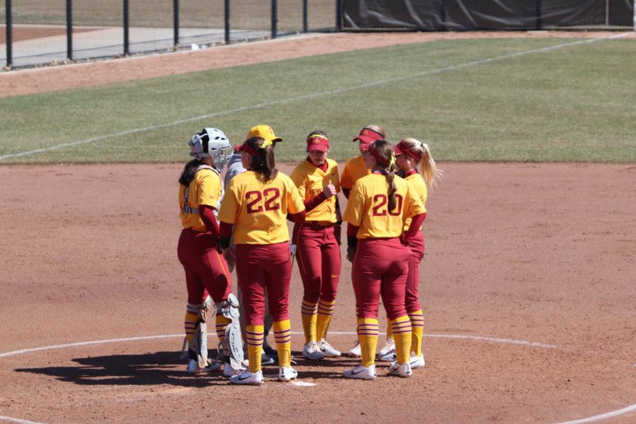 Then-junior Logan Schaben, then-senior Savannah Sanders, then-senior Sally Woolpert, then-senior Kaylee Bosworth, then-junior Sami Williams and then-freshman Kasey Simpson talk strategy with Head Coach Jamie Pinkerton. Iowa State lost to Texas Tech 8-4 on March 31, dropping their record to 18-15 overall and 1-5 in Big 12 play. 