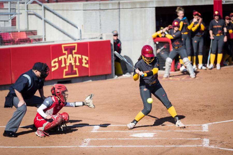 Iowa State senior Taylor Nearad stops herself from swinging at a ball during the Iowa State vs South Dakota softball game held at the Cyclone Sports Complex April 2. The Cyclones had three home run hits and defeated the Coyotes 9-1.