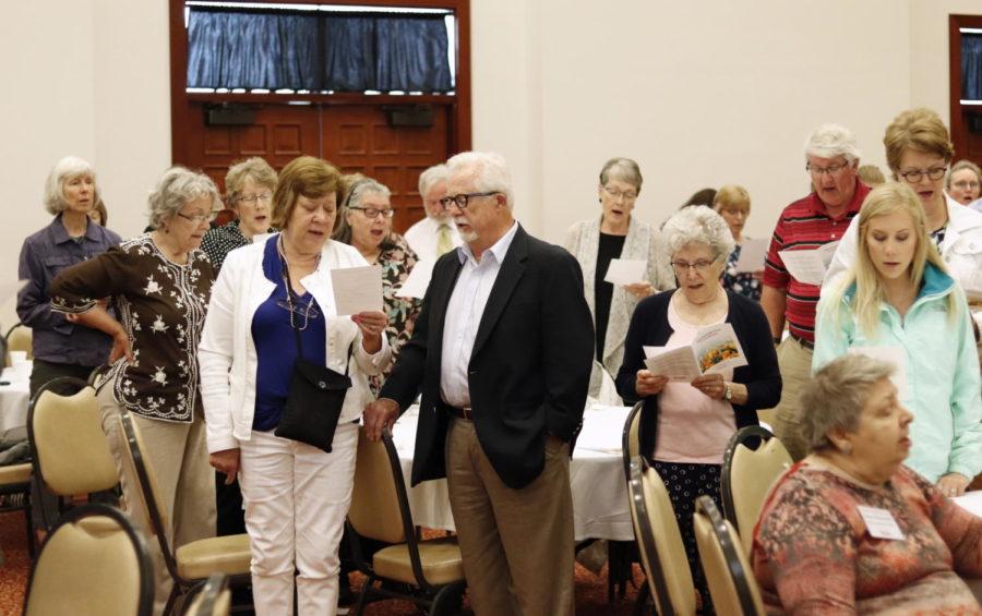 ISU Alumni Center members host Memorial Day Ceremony on May 27. Attendees sang a remembrance song to the tune of The Bells of Iowa State during the ceremony. 
