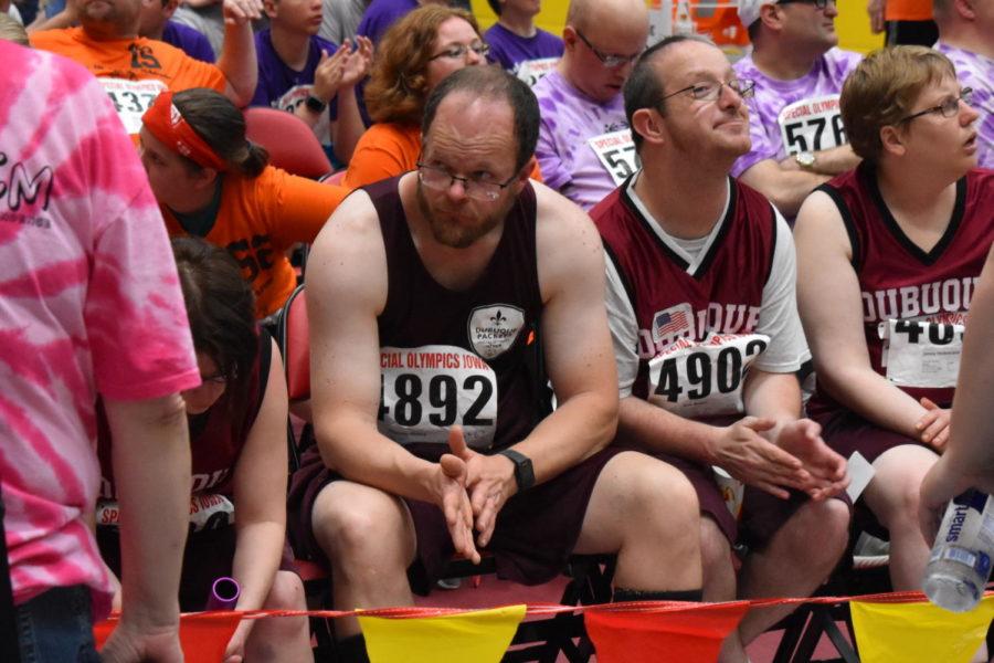 Shannon Hickey and his teammates wait to get their medal from their race at the 2019 Special Olympics.
