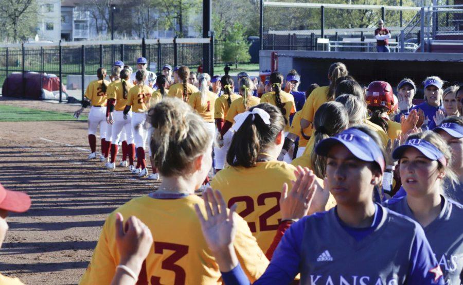 All team members shake hands after the Iowa State vs. Kansas game on May 3. The Cyclones defeated the Jayhawks 3-2.