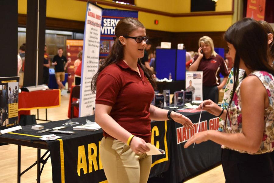 An organization member welcomes an incoming student at the ISU Orientation Resource Fair on June 2 in the Memorial Union. There are different clubs, groups and organizations to welcome incoming students and their parents during the month of June.