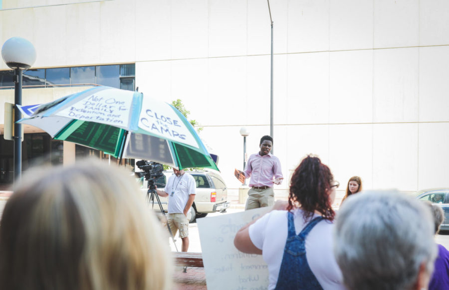 The border violence protest organizer, Dozmen Lee, presents a speech to the crowd on July 3 in front of the Neil Smith Federal Building in Des Moines. 