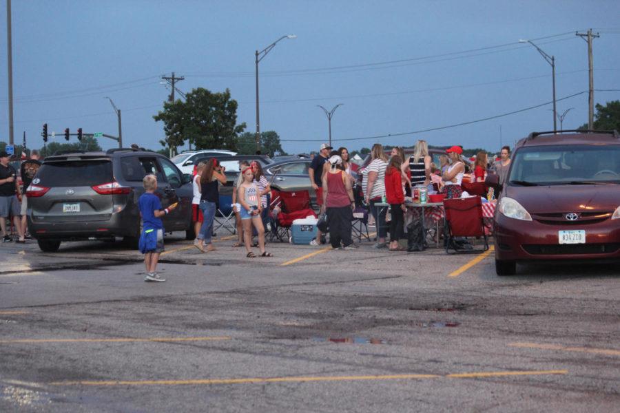 Ames community members gather in the Jack Trice Stadium parking lot to watch the fireworks on July 3. 