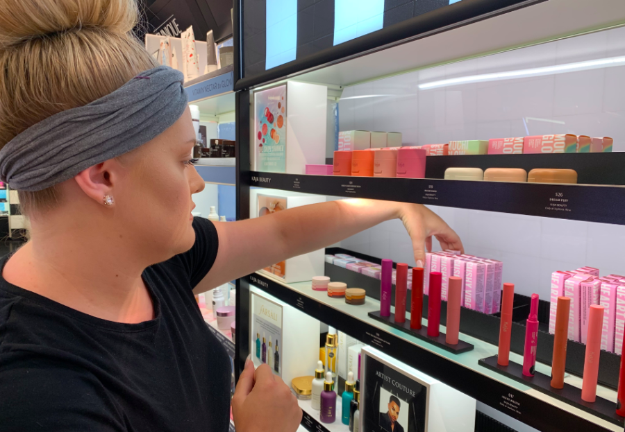 Sephora beauty consultant, Haley Sanders, organizes a new section of makeup featuring Korean beauty products. The section offers a variety of products ranging from highlighters to lip stains. 