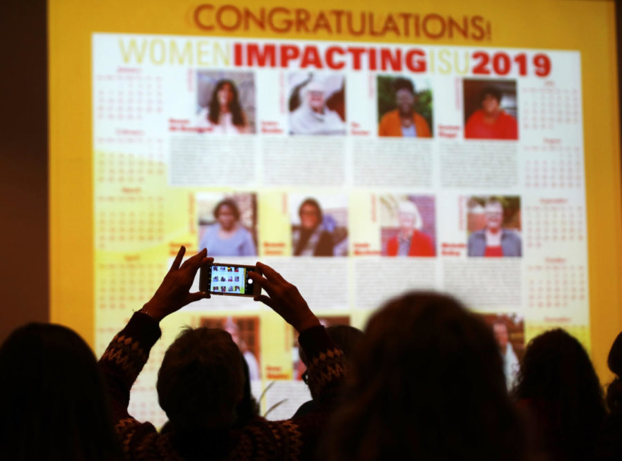 The Women Impacting ISU 2019 calendar is debuted at the end of a reception held to honor those selected to represent Iowa State in the Sun Room of the Memorial Union on Jan. 16.