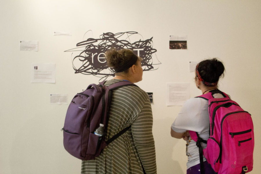 The ReACT Gallery, located in the Christian Petersen Art Museum, will hold an event for its new exhibit named It starts with us: Civility and the 21st Century Land Grant Mission which will be held Sept.4, 2019.Randie Camp (left) and Amy Popillion (right) look at social media statuses that were written in response to Celia Barquin Arozamenas death in 2018. Camp said, It is important that we take time to acknowledge when violence and trauma happens. 