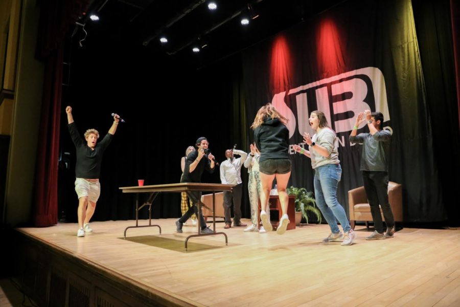 An ISU student celebrates winning $10,000 during David Dobriks appearance at ISU AfterDark August 30 after making a pong ball in a cup. Dobrik is a Youtube personality who is known for giving large gifts.