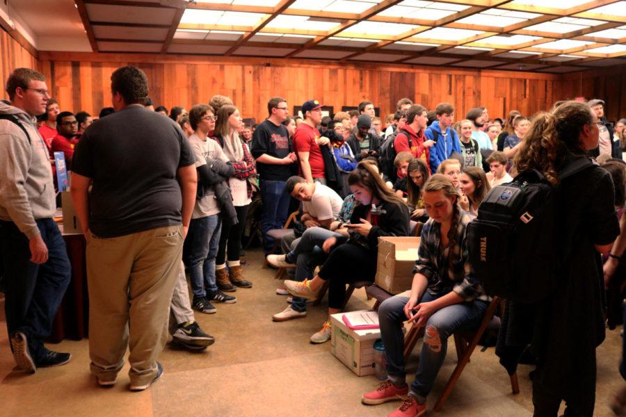 Iowa State students wait patiently for their votes to be counted in the Iowa caucus. From the beginning, the pioneer room was struggling. The caucus organizers ran out of registration forms, making it near impossible for students to register for the caucus.