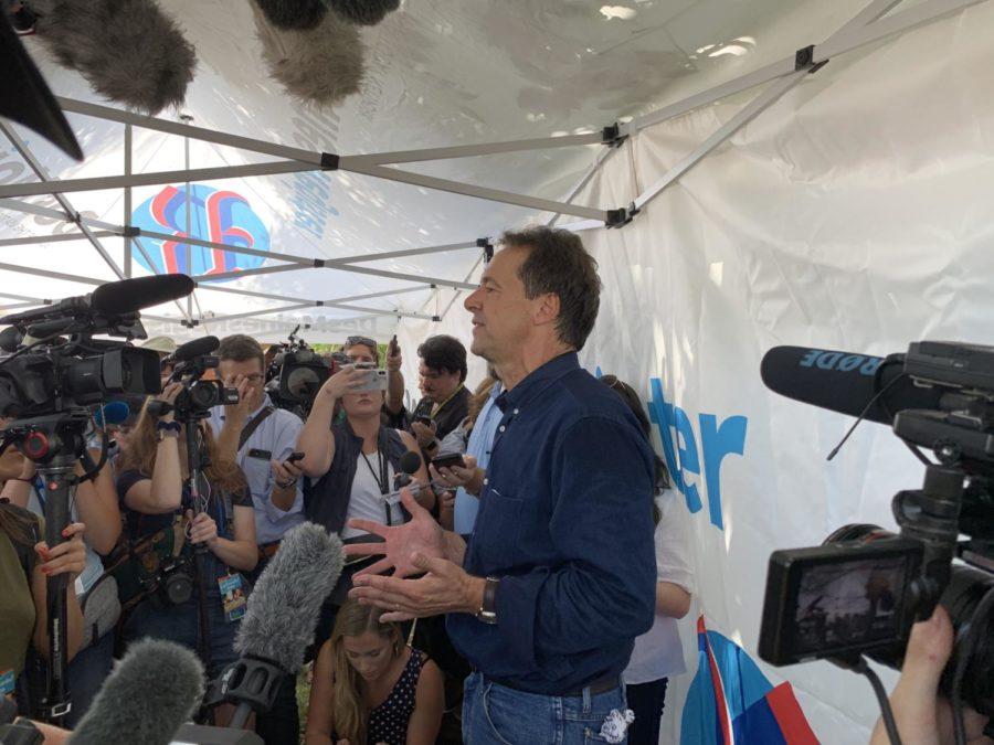Montana Gov. Steve Bullock speaks to reporters Aug. 8, 2019 at the Iowa State Fair. Bullock was asked about health care, and his position in the race should he fail to qualify for the fall debates.