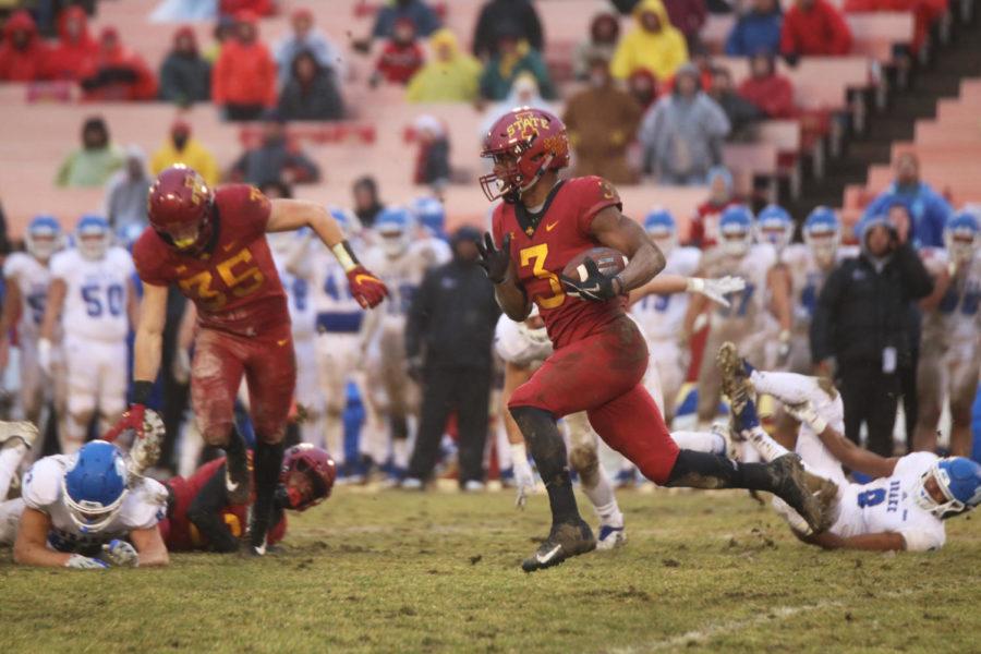 Running back Kene Nwangwu tries to gain yards during the second half of the game against Drake University at Jack Trice Stadium on Dec. 1, 2018. The Cyclones won 27-24.