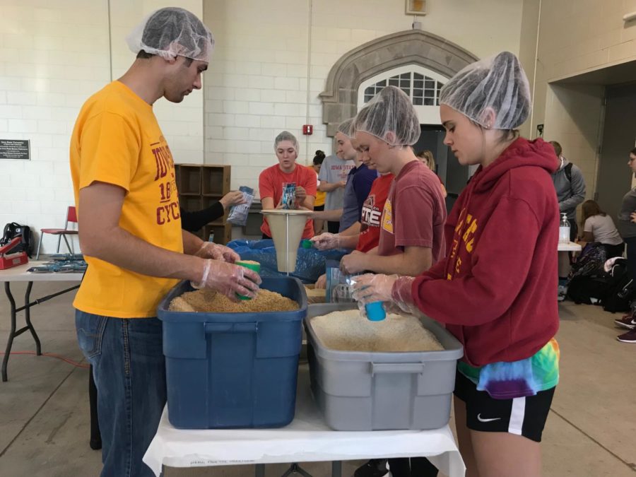College of Agriculture and Life Sciences students each had a task in the assembly line of packaging meals with Meals from the Heartland during 2019 CALS Week.