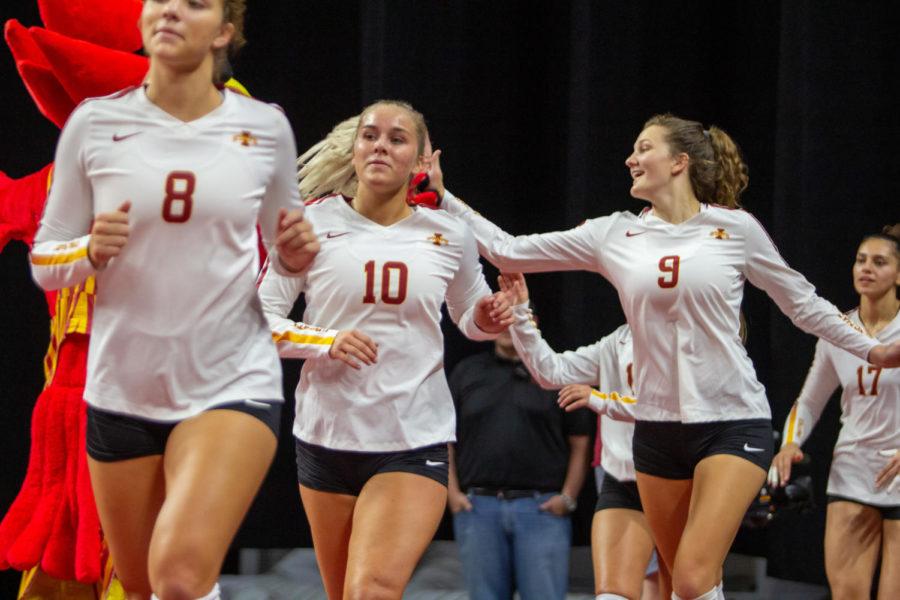 The Iowa State volleyball team enters the court during a home game against South Dakota on Sept. 3. Iowa State fell to Penn State in straight sets on Friday.