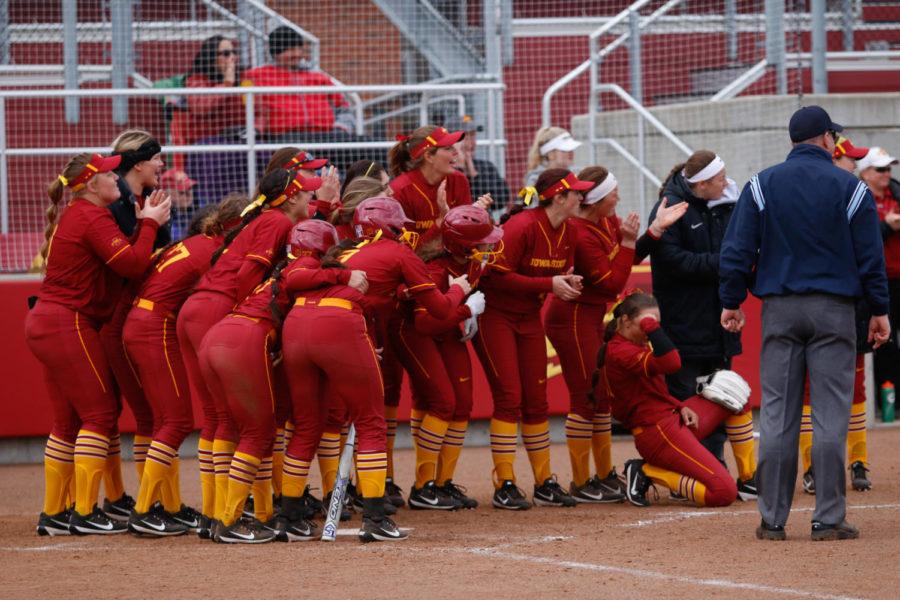 Iowa States bench wait at homeplate following a home run during the Cyclones 11-4 loss to Texas at the Cyclone Sports Complex.