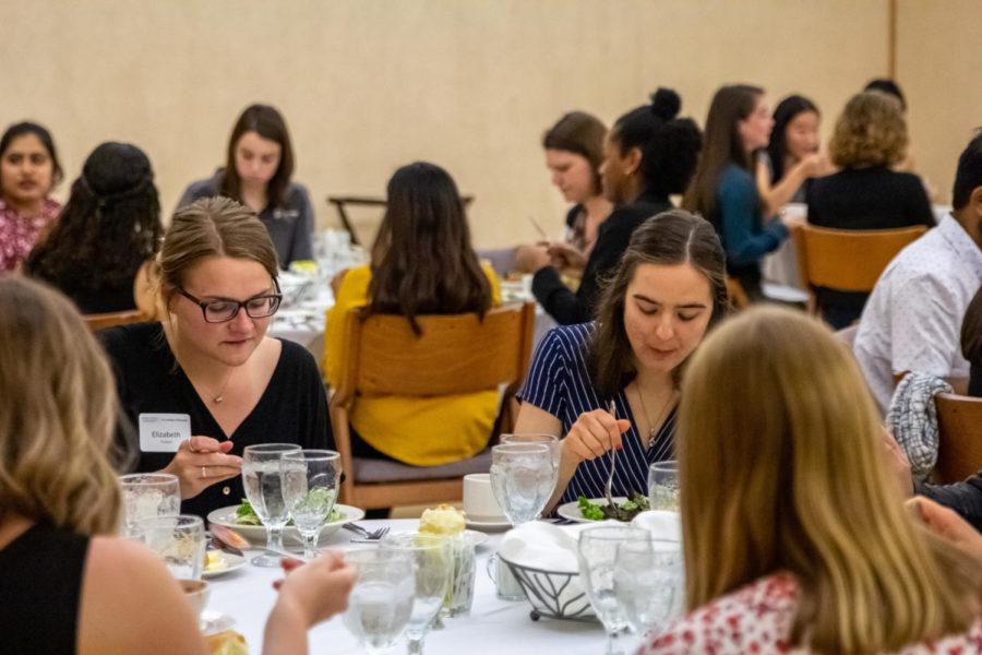 Students learn etiquette skills during a professional dinner environment, in the Gallery Room on Sept. 17.