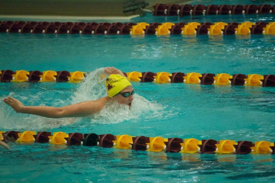 Then-freshman Ali Basel swims the butterfly in the Womens 200 M. Iowa State Swim and Dive hosted the Alumni Cardinal and Gold meet Sept. 30, 2016.