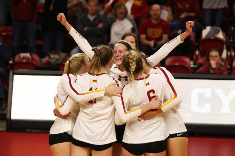Members+of+the+Iowa+State+volleyball+team+celebrate+scoring+a+point+during+their+game+against+Kansas+State+on%C2%A0Oct.+26%C2%A0at+Hilton+Coliseum.+The+Cyclones+won+3-1.