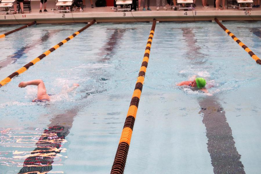 Special Olympics athletes Wendy Thompson(left) and Amy Hickey(right) participate in the second heat of the 100m freestyle at the Beyer Hall swimming pool on May 24. 