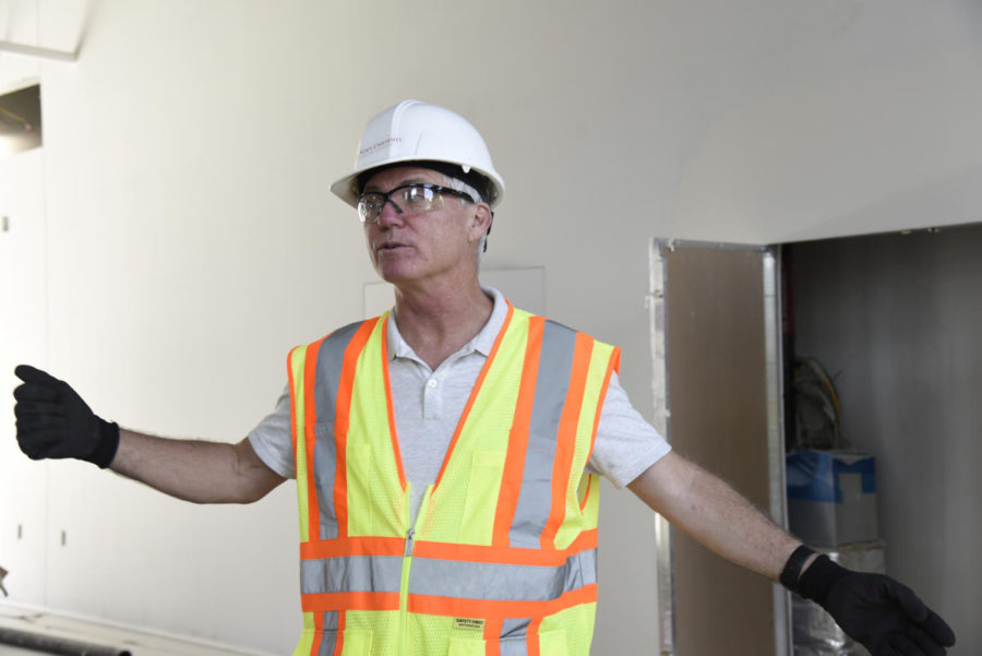 James Oliver, director of the student innovation center, leads a tour showing the progress of the new Student Innovation Center as of Sept. 17. The building is planned to open in January.