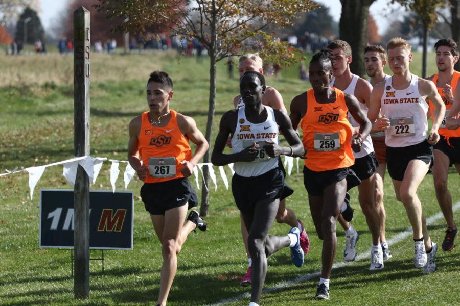 Iowa States Edwin Kurgat runs at the front of the pack at the Big 12 Cross Country Championship on Friday in Ames. Kurgat took first place in the mens race. 