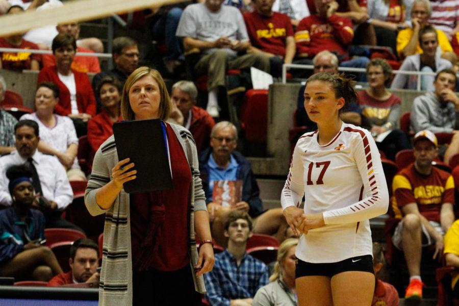 Suzanne Horner, then-senior, and Christy Johnson-Lynch, head coach, discuss strategy on Aug. 26, 2016. Iowa State beat Wichita State by a final score of 3-0.