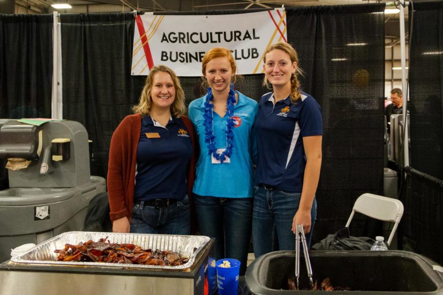 On Oct. 12, the Iowa State Bacon Expo hosted its seventh annual event for Iowa State students and their families to learn more about the swine industry and enjoy all kinds of bacon. Three members of the Agricultural Business Club prepare to hand out bacon samples.