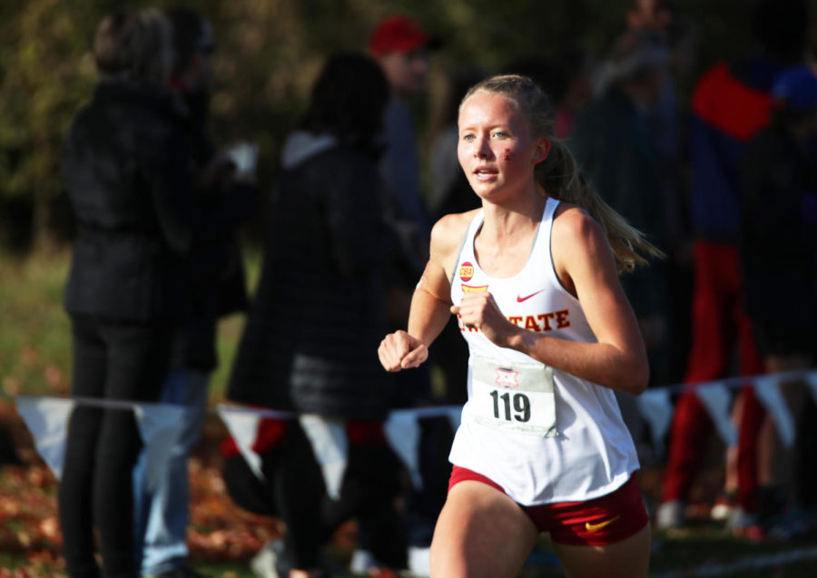 Iowa State distance runner Cailie Logue races against nine other universities during the women’s 6K at the 2018 Big 12 Cross Country Championships on Oct. 26, 2018, at Iowa State. Logue placed first overall for the women’s division with a time of 19:53.8. The women’s team placed first overall with a score of 35, winning the Big 12 Championship.