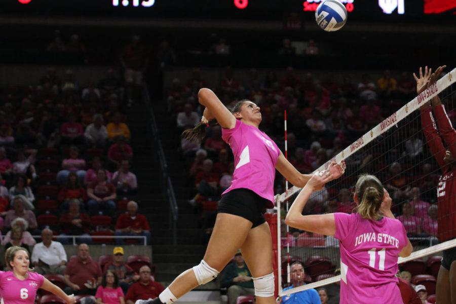 Middle+blocker+Candelaria+Herrera+spikes+the+ball+during+the+volleyball+game+against+University+of+Oklahoma+at+Hilton+Coliseum+on+Oct.+3.+The+Cyclones+lost+3-1.