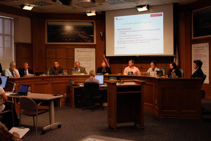 The Ames City Council conducting business on June 18. The council discussed property rental concerns in the wake of the repeal of the rental cap.