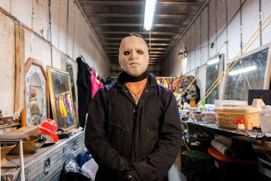 Keegan Kearney displays his costume in one of the main trailers before the Haunted Forest opens. Kearney enjoys getting into character for each role he performs. Although clown roles are his favorite, Kearney is acting as a combination of Jason Voorhees and a slasher this year.