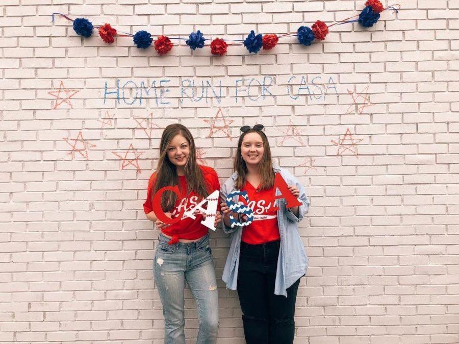 Nicole Ernst (right), senior in apparel, merchandising and design and fundraising director for Kappa Alpha Theta, and Hannah Noble (left), senior in public relations and chief external affairs officer for Kappa Alpha Theta at the spring 2019 Homerun for CASA philanthropy event.