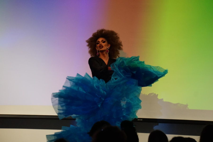 Performer Jaymee Sexton lip synced and danced to Disco Mix during the All Ages Drag show April 6 at the Ames Public Library. The performer had three different outfits during their performance and interacted with the crowd.